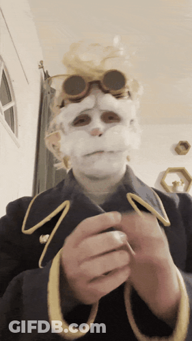 Person In Costume With White Face And Goggles GIF
