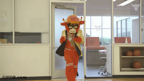 Person In Cow Costume Walking Through Door GIF