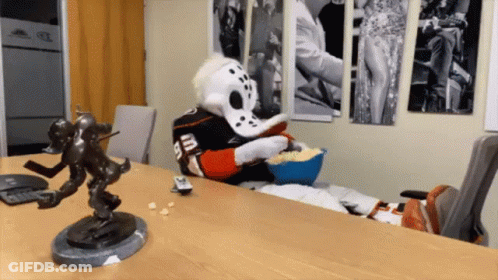 Person In Dalmatian Mask Using Tablet GIF