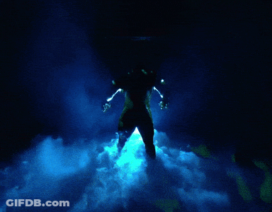 Person In Dark Room With Blue Light GIF