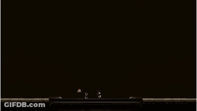 Person In Dark Room With Red Laser Beam GIF