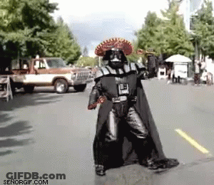 Person In Darth Vader Costume Walking GIF