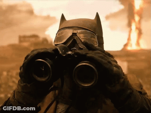Person In Gas Mask And Goggles Looking Through Binoculars GIF