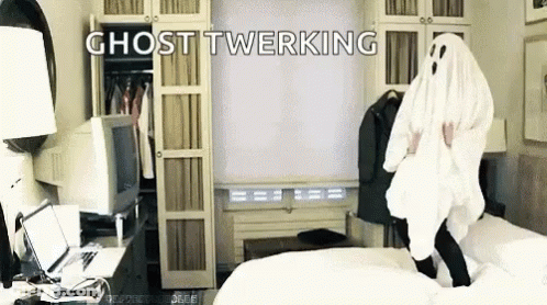 Person In Ghost Costume Jumping On Bed GIF