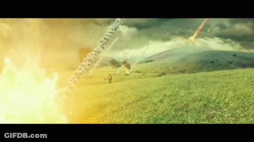 Person In Grassy Field With Flying Rocket GIF