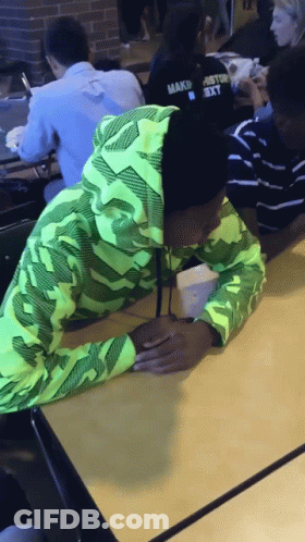 Person In Green Hoodie Saying Make GIF
