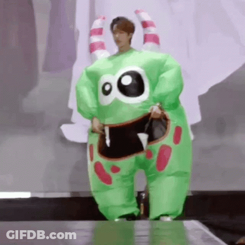 Person In Green Inflatable Monster Costume GIF