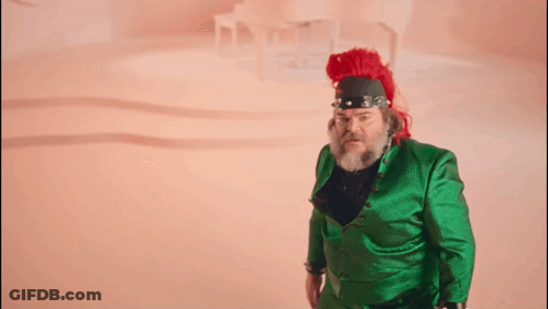 Person In Green Outfit Holding Orange Ball GIF