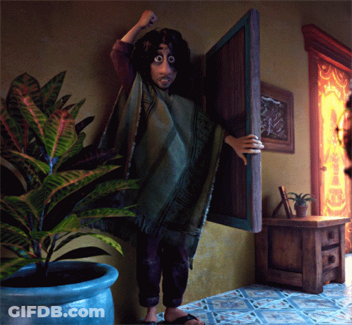 Person In Green Poncho Standing In Front Of Door GIF