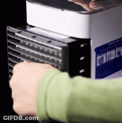 Person In Green Shirt Holding Device Saying Arctic Air GIF