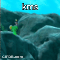 Person In Green Shirt Standing On Rock GIF