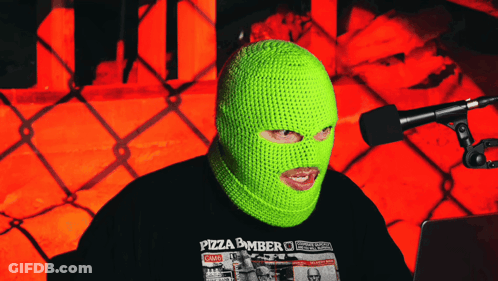 Person In Green Ski Mask And Pizza Bomber T-Shirt GIF