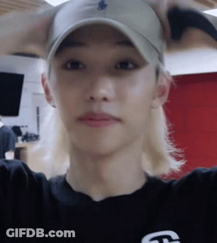 Person In Hat And Black Shirt GIF