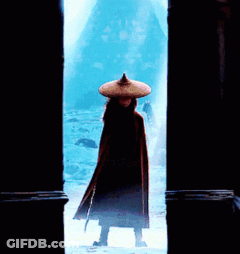 Person In Hat And Cape Standing In Snow GIF