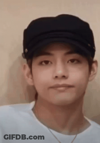 Person In Hat And White Shirt GIF