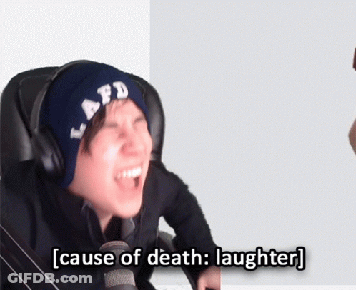 Person In Headphones And Hat Laughing GIF