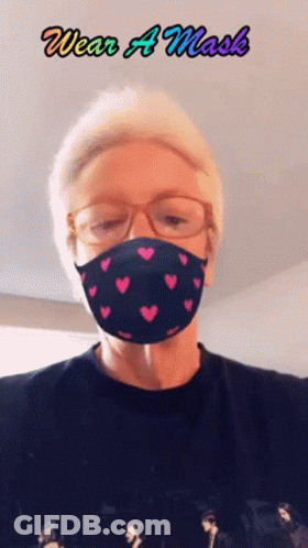 Person In Heart Mask Saying Wear A Mask GIF