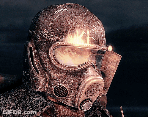 Person In Helmet And Gas Mask With Fire GIF
