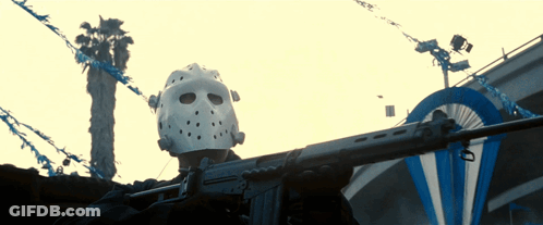 Person In Hockey Mask Holding Gun GIF