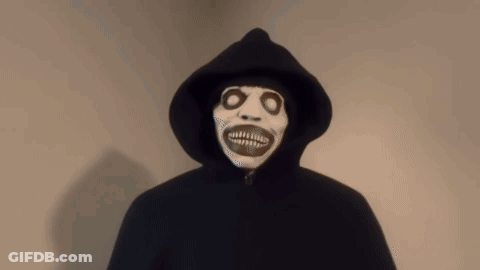 Person In Hooded Cape With Skeleton Face GIF