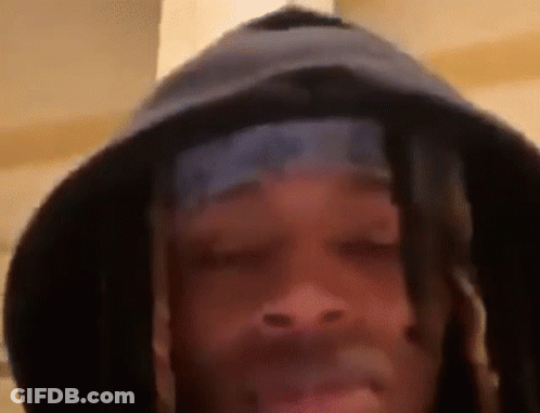 Person In Hooded Hat And Bandana GIF