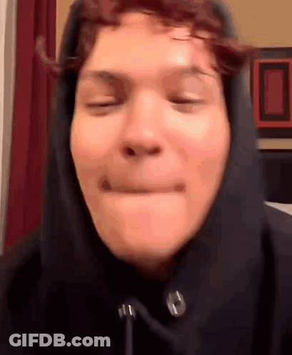 Person In Hoodie Making Face GIF