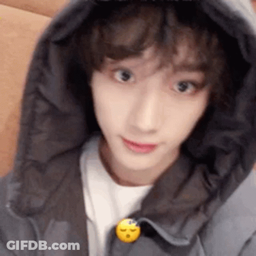 Person In Hoodie With Smiley Face GIF