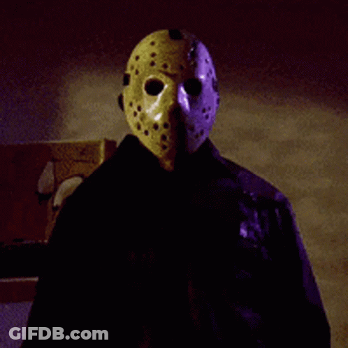 Person In Jason Voorhees Mask And Black Jacket GIF