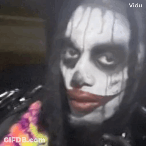 Person In Joker Costume GIF