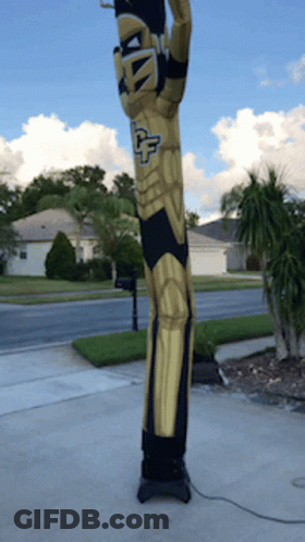 Person In Knight Costume With Letter U GIF