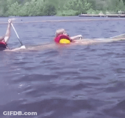 Person In Life Jacket Swimming GIF