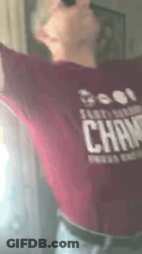 Person In Maroon Shirt Saying Champions GIF
