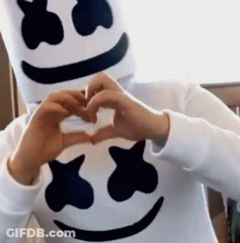 Person In Marshmello Costume Making Heart Shape GIF