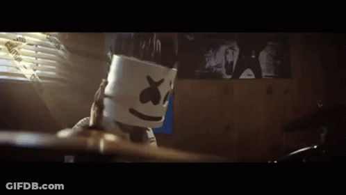 Person In Marshmello Mask Playing Drums In Bedroom GIF