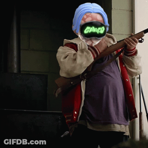 Person In Mask Saying Cargo Holding Gun GIF
