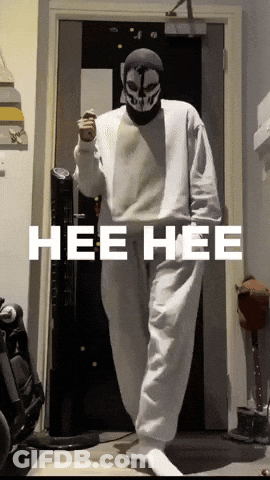Person In Mask Standing In Front Of Door Saying Hee Hee GIF