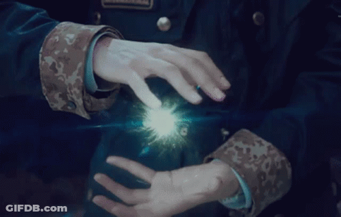 Person In Military Uniform Holding Light GIF