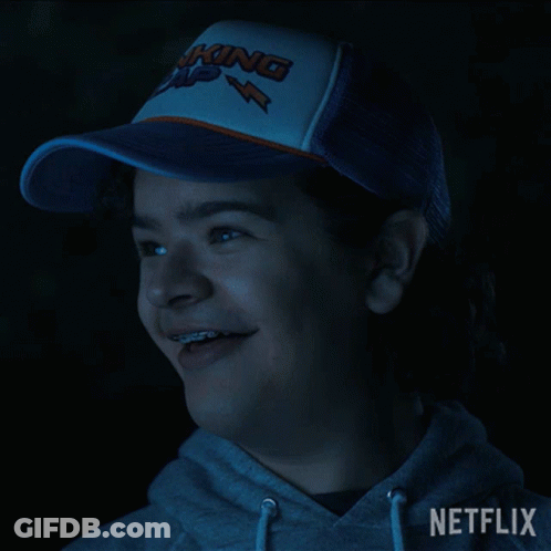 Person In Netflix Hoodie And Trucker Hat GIF