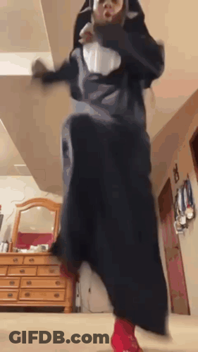 Person In Nun Costume Jumping GIF