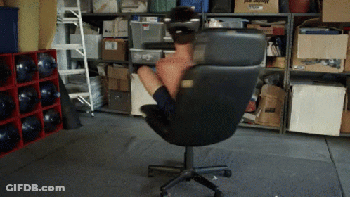 Person In Office Chair With Just Moved Box GIF