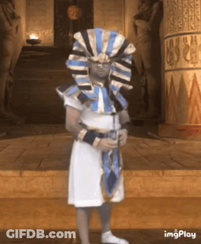 Person In Pharaoh Costume At Building GIF