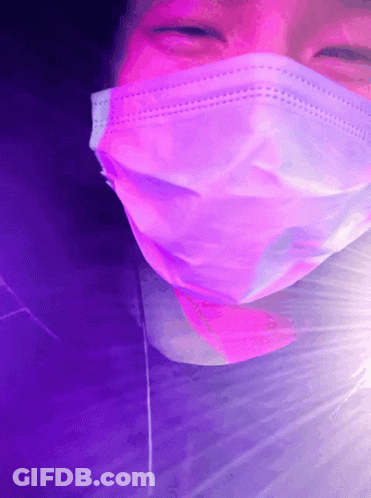 Person In Pink Face Mask GIF