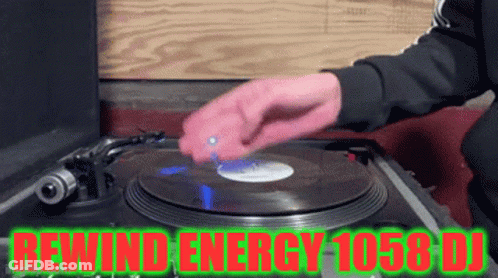 Person In Pink Gloves Playing Record Rewind Energy 105.8 DJ GIF