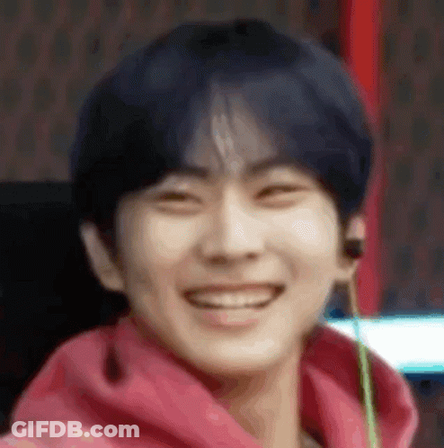 Person In Pink Hoodie With Headphones GIF