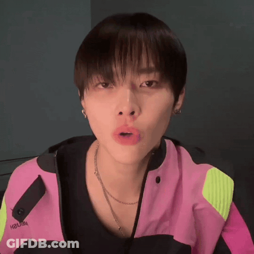 Person In Pink Jacket Saying Hawaii GIF