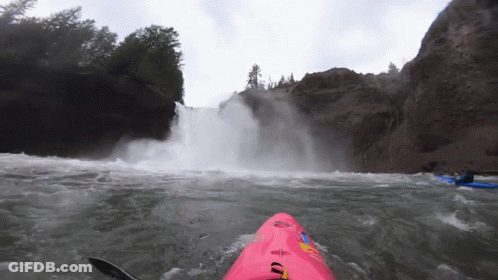 Person In Pink Kayak With Letter U GIF