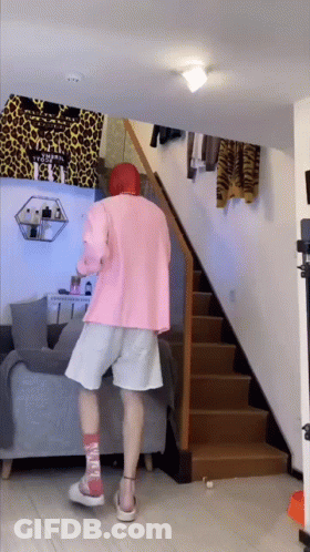 Person In Pink Shirt And White Shorts GIF