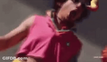 Person In Pink Shirt And Yellow Belt GIF