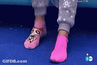 Person In Pink Socks With Dog GIF