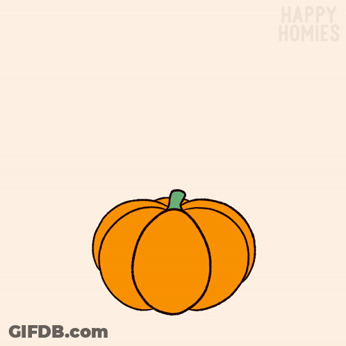 Person In Pumpkin Surrounded By Candy And Candy Corn GIF
